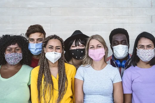 Diverse Group of Young People Wearing Masks to Prevent Spreading Illness